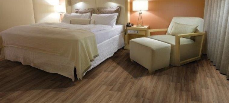 Piso laminado instalado em quarto pela Camargão Pisos em Brasília